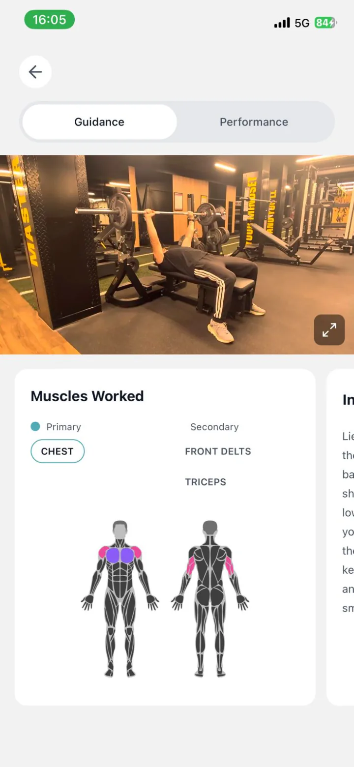 Exercise guidance screen showing demo video and muscles worked diagram